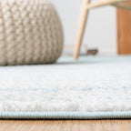 SAFAVIEH Area Rug 6x9 - Adirondack Collection - Aqua & Ivory, Modern Ombre Design, Non Shedding & Easy to Clean, Ideal for Living Room, Bedroom, Office, Dining Space (ADR113J)