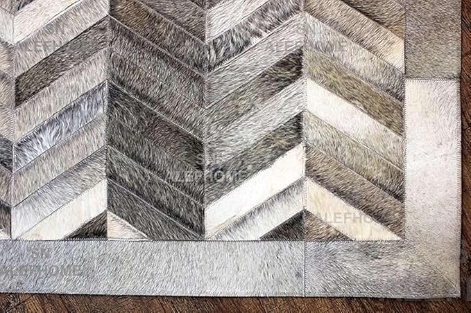 Chevron Pattern Faux Cowhide Area Rug | Non-Slip Leather Carpet for Living Room, Bedroom, and Office | Modern Designer Rug for Home Décor(4x6 ft_Grey)