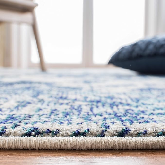 SAFAVIEH Monaco Collection Area Rug - 8' x 10', Ivory & Blue, Boho Chic Medallion Distressed Design, Non-Shedding & Easy Care, Ideal for High Traffic Areas in Living Room, Bedroom (MNC243A)