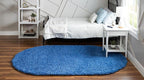 Unique Loom Solid Shag Collection Area Rug (5' 3" x 8' Oval, Periwinkle Blue)