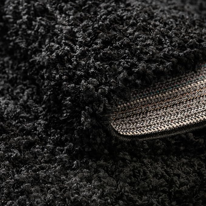 Unique Loom Solid Shag Collection Area Rug (7' 10" x 10' Oval, Jet Black)