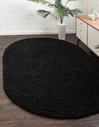 Unique Loom Solid Shag Collection Area Rug (7' 10" x 10' Oval, Jet Black)
