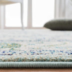 SAFAVIEH Monaco Collection Accent Rug - 4' x 5'7", Light Blue & Ivory, Medallion Distressed Design, Non-Shedding & Easy Care, Ideal for High Traffic Areas in Entryway, Living Room, Bedroom (MNC243K)