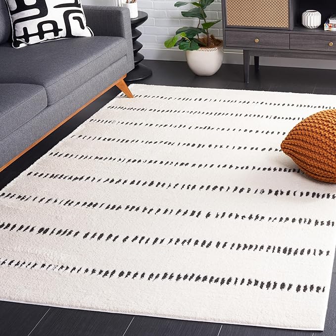 SAFAVIEH Melody Collection Area Rug - 6' x 9', Ivory/Black, Geometric Design, Ideal for High Traffic Areas in Living Room, Bedroom, Dining (MEL114A)