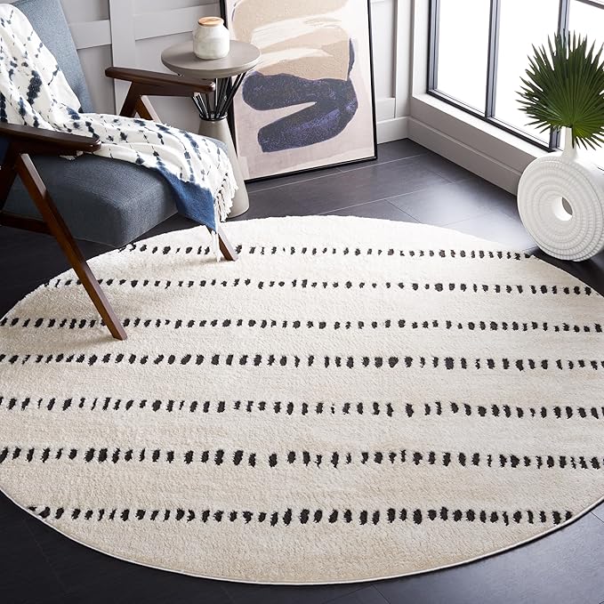 SAFAVIEH Melody Collection Area Rug - 6'7" Round, Ivory & Black, Modern Design, Non-Shedding & Easy Care, Ideal for High Traffic Areas in Living Room, Bedroom, Dining Room (MEL114A-7R)