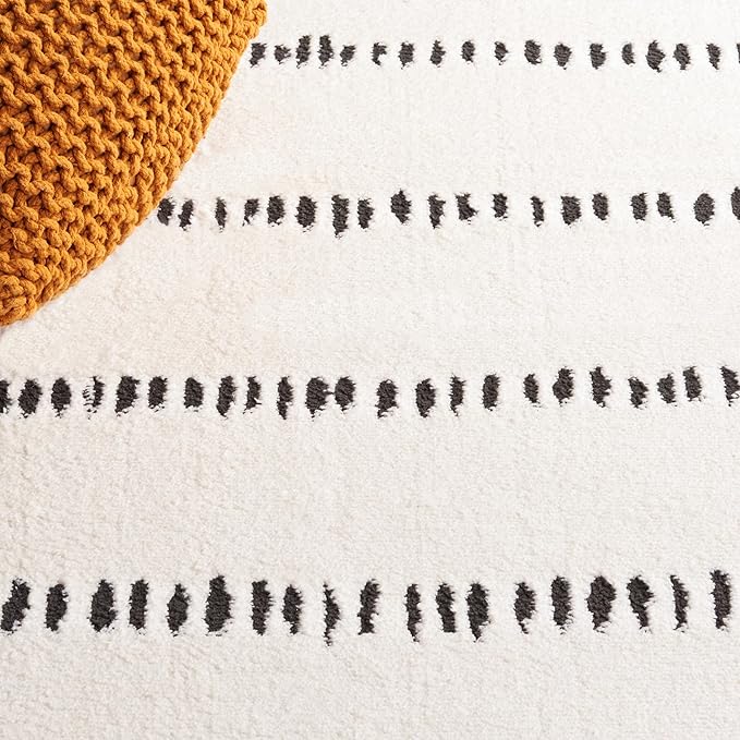 SAFAVIEH Melody Collection Area Rug - 2'2" x 6' Runner, Ivory/Black, Geometric Design, Ideal for High Traffic Areas in Living Room, Bedroom, Dining (MEL114A)