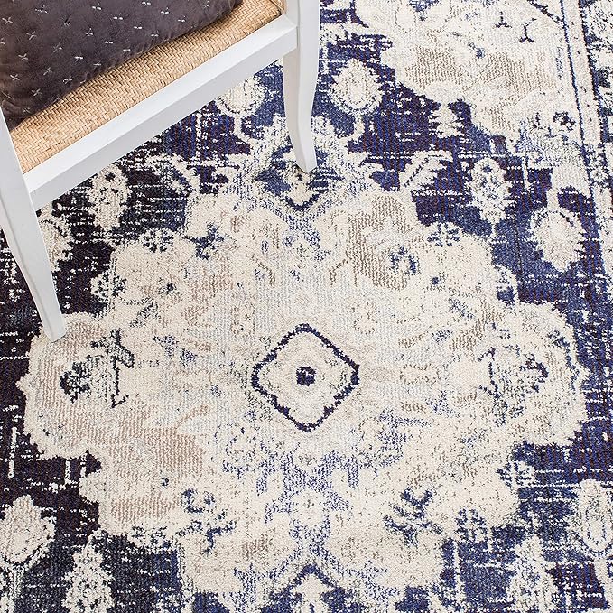 SAFAVIEH Monaco Collection Area Rug - 5'1" x 7'7", Ivory & Navy, Boho Chic Medallion Distressed Design, Non-Shedding & Easy Care, Ideal for High Traffic Areas in Living Room, Bedroom (MNC243C)