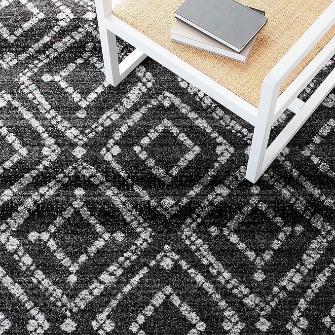 SAFAVIEH Adirondack Collection Accent Rug - 2'6" x 4', Black & Ivory, Modern Distressed Design, Non-Shedding & Easy Care, Ideal for High Traffic Areas in Entryway, Living Room, Bedroom (ADR131A)