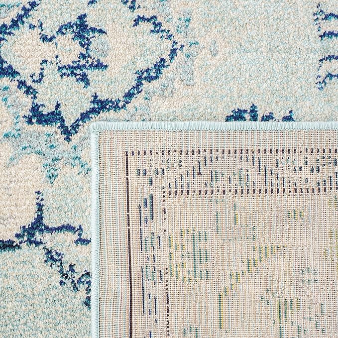 SAFAVIEH Monaco Collection Area Rug - 6'7" x 9'2", Light Blue & Ivory, Boho Chic Medallion Distressed Design, Non-Shedding & Easy Care, Ideal for High Traffic Areas in Living Room, Bedroom (MNC243K)