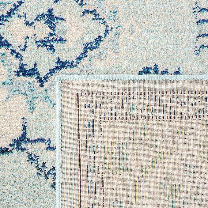 SAFAVIEH Monaco Collection Area Rug - 6'7" x 9'2", Light Blue & Ivory, Boho Chic Medallion Distressed Design, Non-Shedding & Easy Care, Ideal for High Traffic Areas in Living Room, Bedroom (MNC243K)
