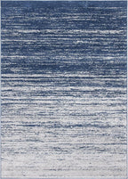 SAFAVIEH Adirondack Collection Area Rug - 5'5" x 7'7", Navy & Grey, Modern Ombre Design, Non Shedding & Easy to Clean, Ideal for Living Room, Bedroom, Office, Dining Space (ADR113E)