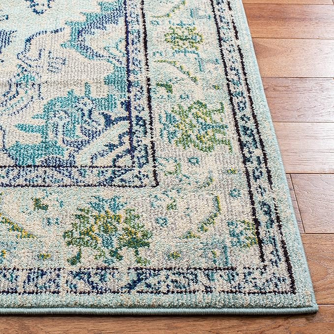 SAFAVIEH Monaco Collection Area Rug - 6'7" x 9'2", Light Blue & Ivory, Boho Chic Medallion Distressed Design, Non-Shedding & Easy Care, Ideal for High Traffic Areas in Living Room, Bedroom (MNC243K)