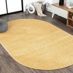 JONATHAN Y Haze Solid Low-Pile Mustard 5x8 Oval Indoor Area Rug, Coastal,Bohemian,Minimalist,Classic, Easy-Cleaning for Living Room,Bedroom,Kitchen,Pet Friendly,Non-Shedding (SEU100B-5OV)