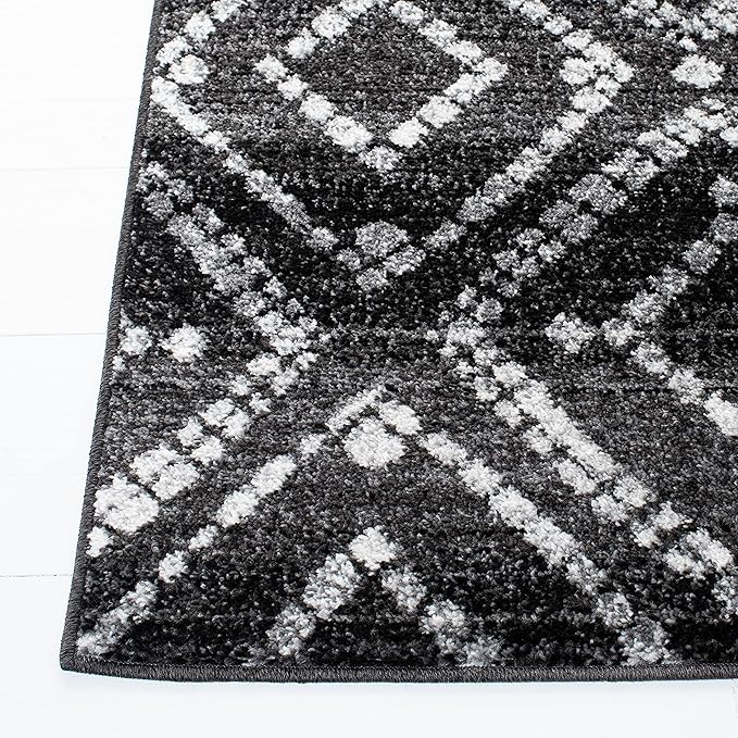 SAFAVIEH Adirondack Collection Accent Rug - 2'6" x 4', Black & Ivory, Modern Distressed Design, Non-Shedding & Easy Care, Ideal for High Traffic Areas in Entryway, Living Room, Bedroom (ADR131A)