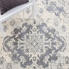 SAFAVIEH Monaco Collection Area Rug - 6'7" x 9'2", Ivory & Grey, Boho Chic Medallion Distressed Design, Non-Shedding & Easy Care, Ideal for High Traffic Areas in Living Room, Bedroom (MNC243B)